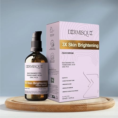 Dermisque 3X Skin Brightening Face Serum bottle and packaging on a wooden tray with a light gray background