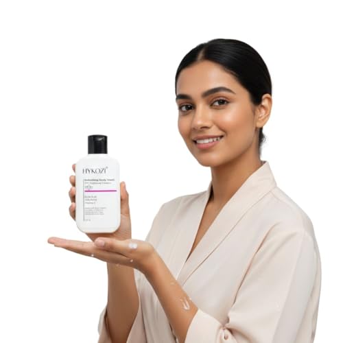 Woman holding a bottle of Hykozibrighteing body wash on a white background