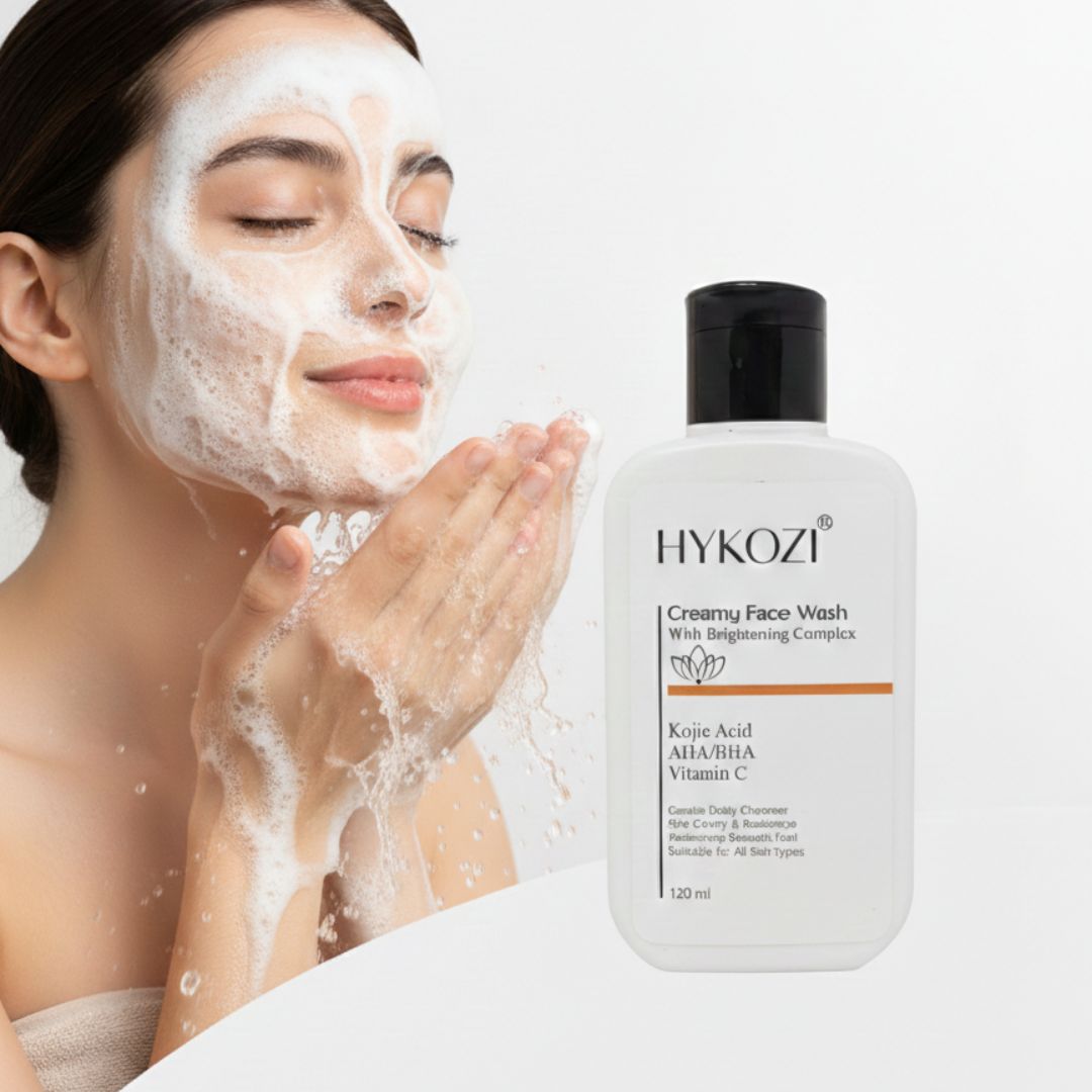 A woman applying HYKOZI Creamy  Brightening Foaming Face Wash on the  Face